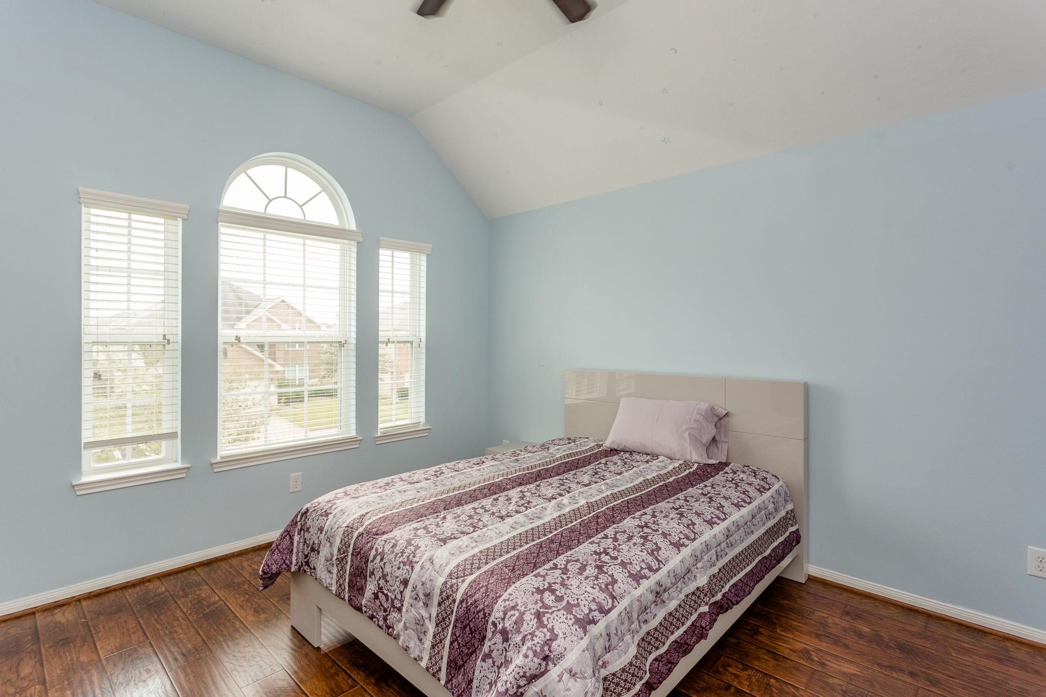 3430 Lilac Ranch Drive Katy, TX 77494 - Photo 22 of 29 a bedroom with a bed and a window