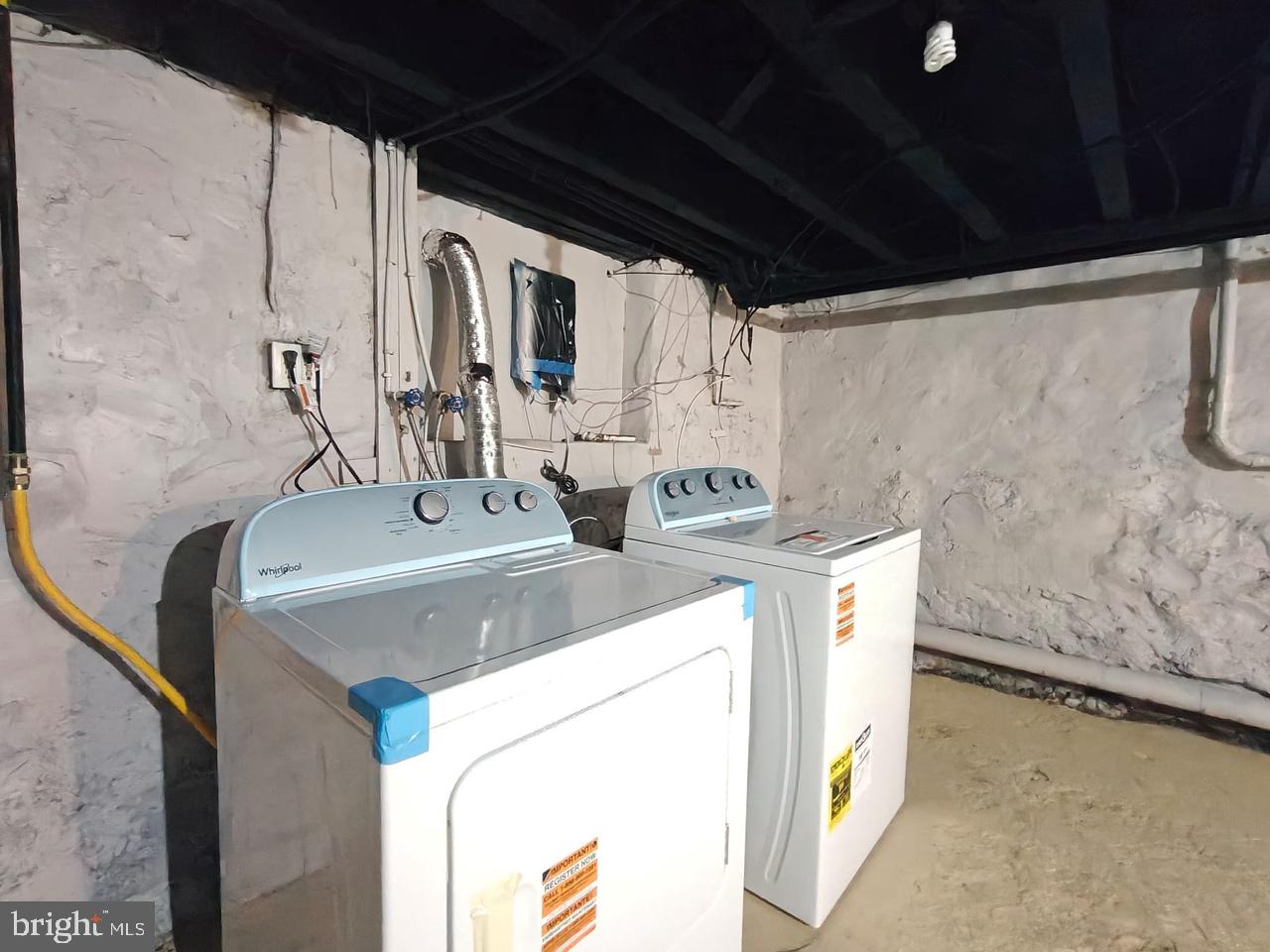 5818 Addison Street Philadelphia, PA 19143 - Photo 11 of 11 a utility room with dryer and washer