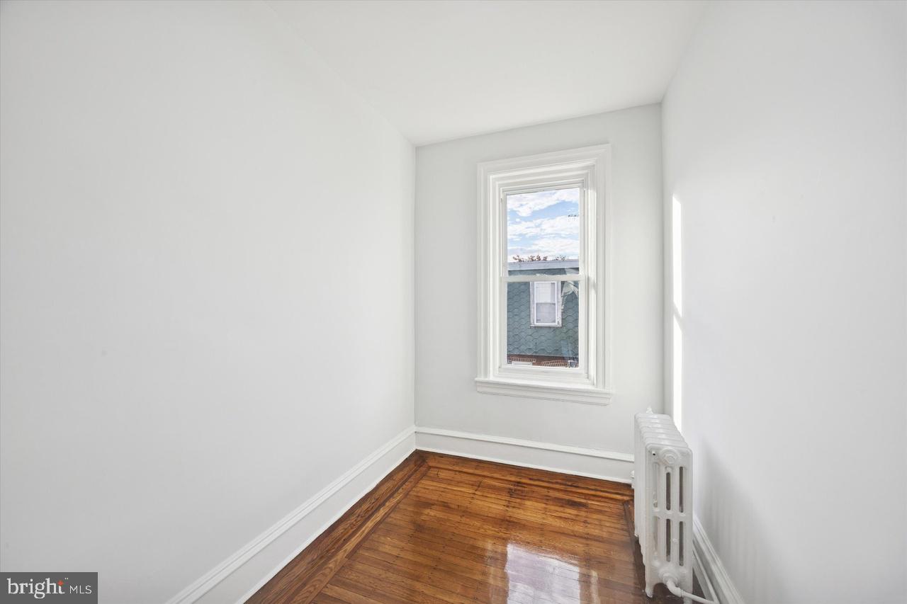 5818 Addison Street Philadelphia, PA 19143 - Photo 10 of 11 a view of an empty room and window