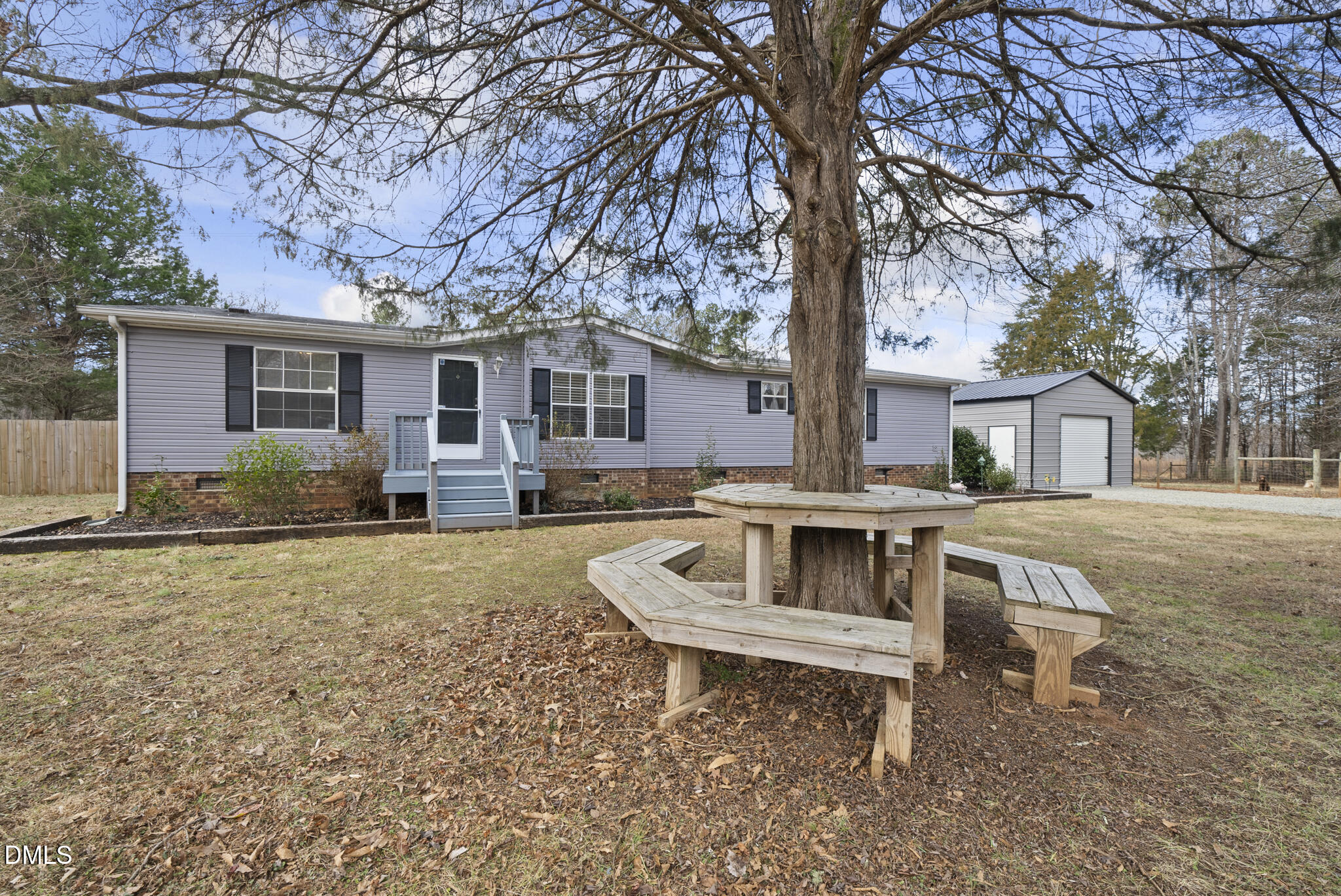 4703 Trinity Lane Rougemont, NC 27572 - Photo 2 of 7 front view of house with a yard