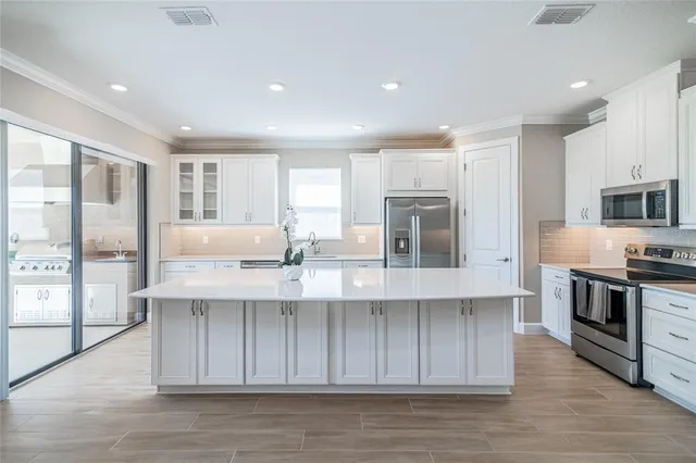 a view of living room with furniture and flat screen tv