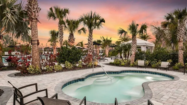 a room with a table and book shelf