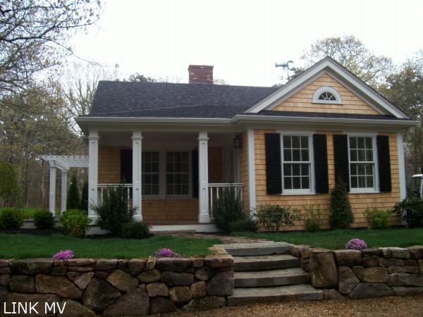 243 Katama Road Edgartown, MA 02539 - Photo 6 of 6 a front view of a house with a yard
