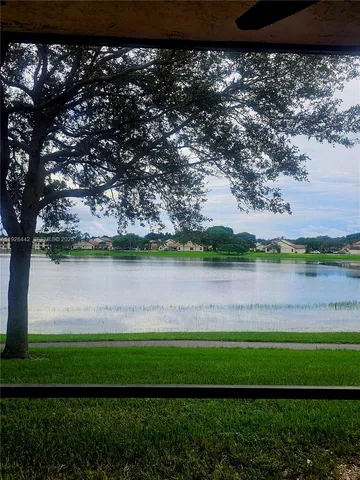 a view of a lake from a yard