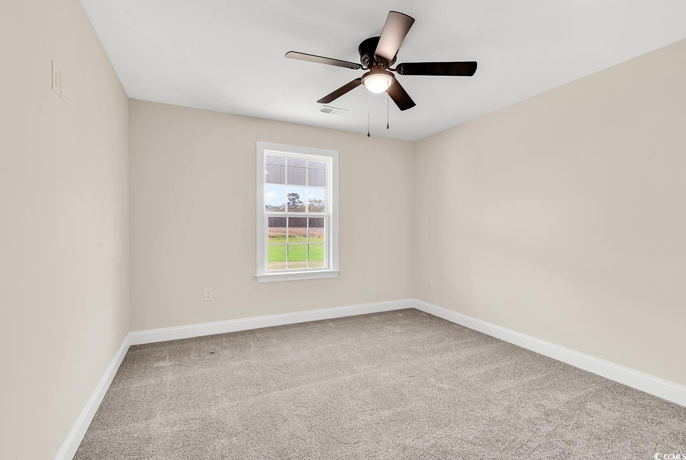 3538 Good Luck Road Aynor, SC 29511 - Photo 29 of 34 Spare room with visible vents, carpet, baseboards,