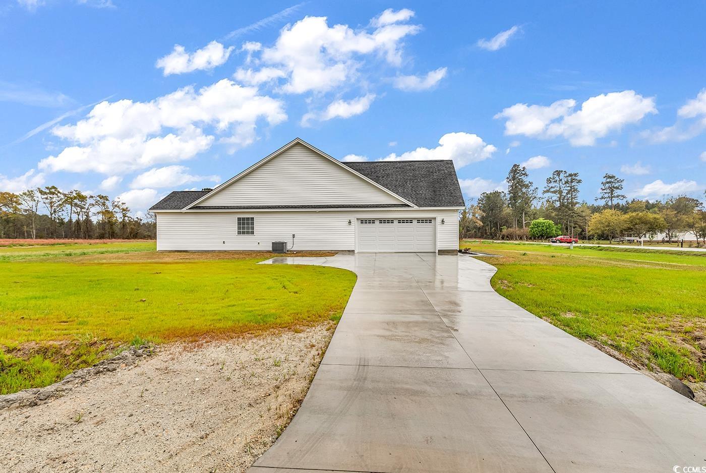 3538 Good Luck Road Aynor, SC 29511 - Photo 3 of 34 View of property exterior with central AC unit, an