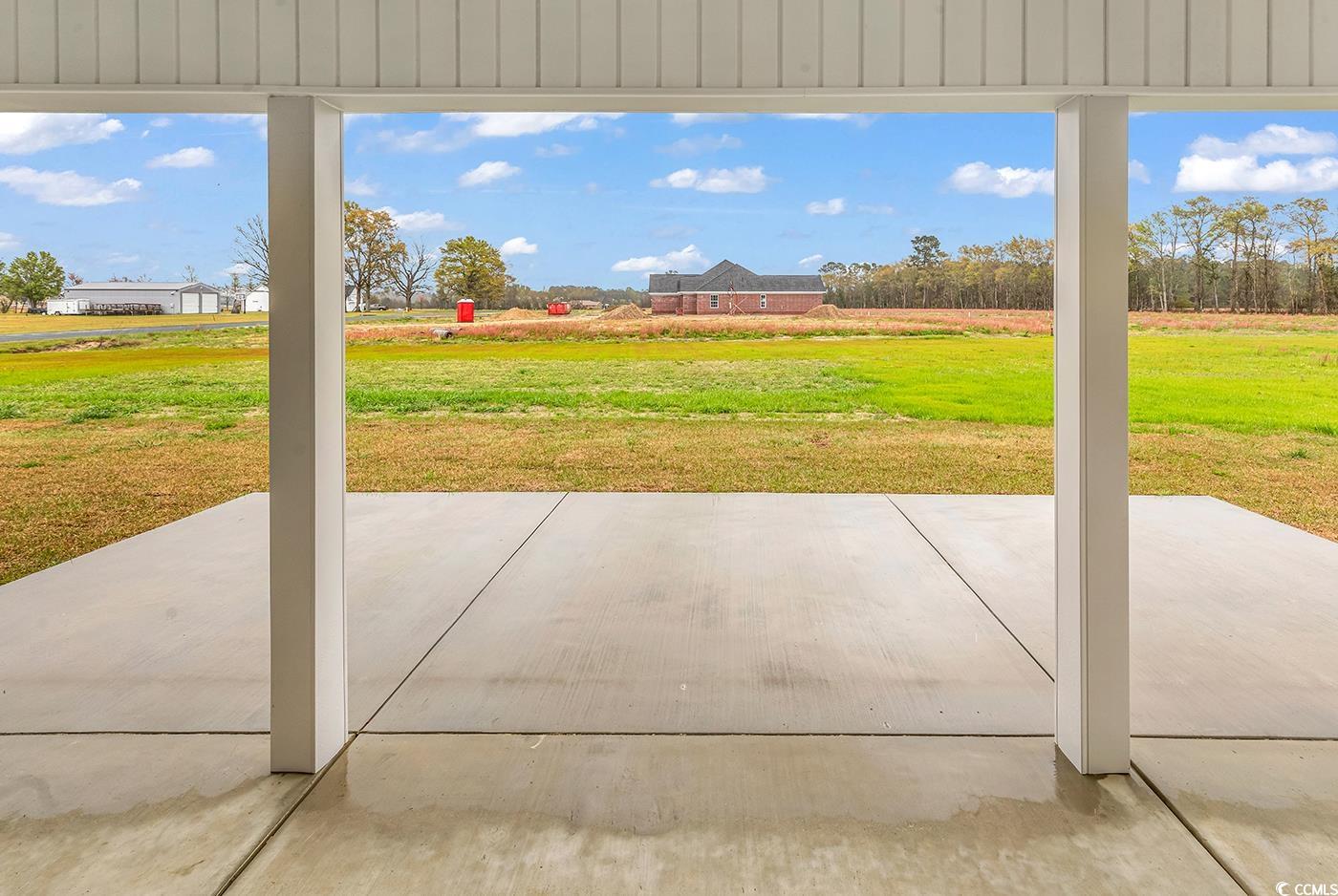 3538 Good Luck Road Aynor, SC 29511 - Photo 7 of 34 View of patio featuring a rural view