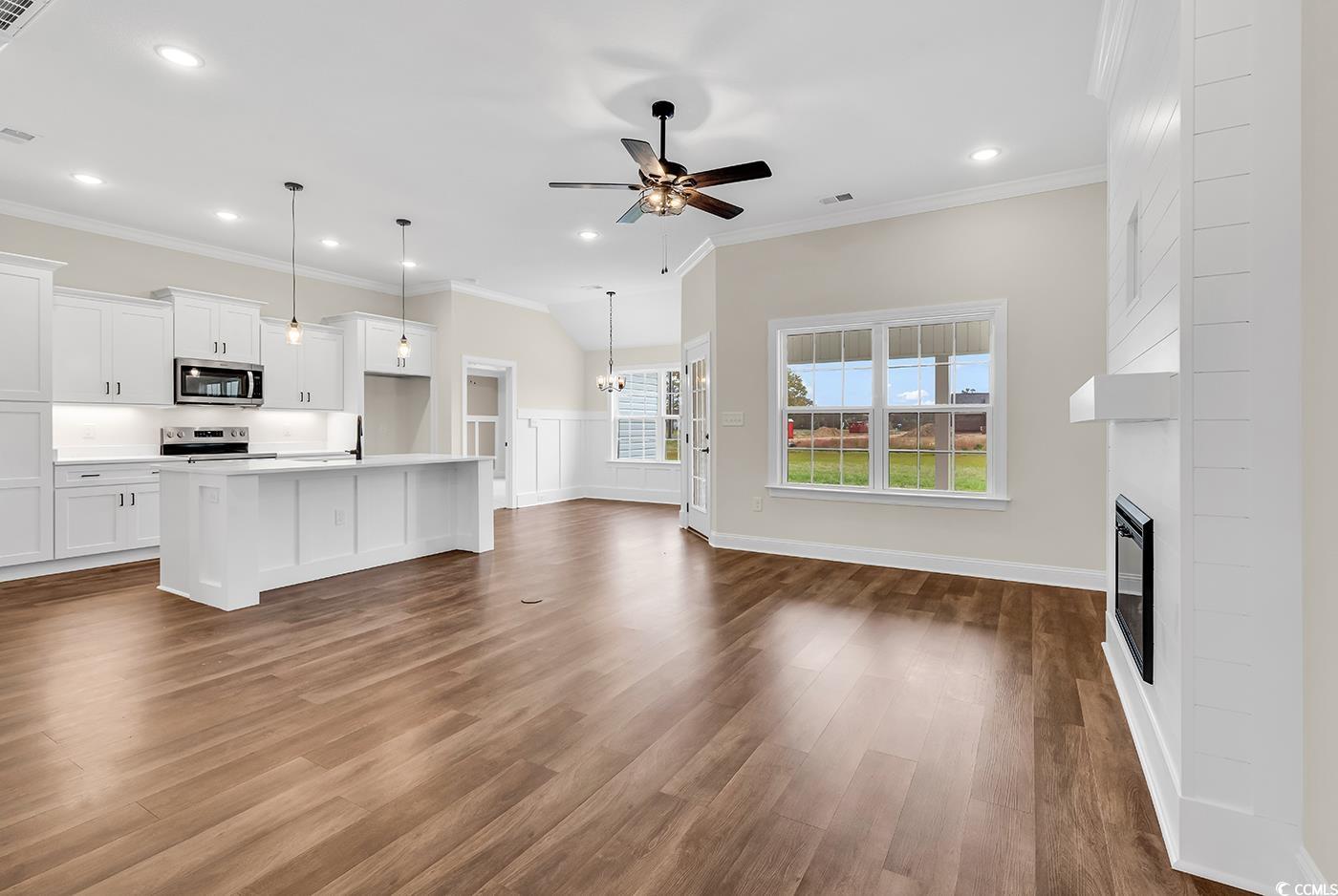 3538 Good Luck Road Aynor, SC 29511 - Photo 8 of 34 Kitchen featuring dark wood-style flooring, stainl