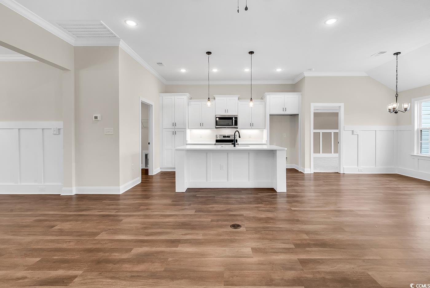 3538 Good Luck Road Aynor, SC 29511 - Photo 9 of 34 Kitchen with a sink, white cabinetry, stainless st
