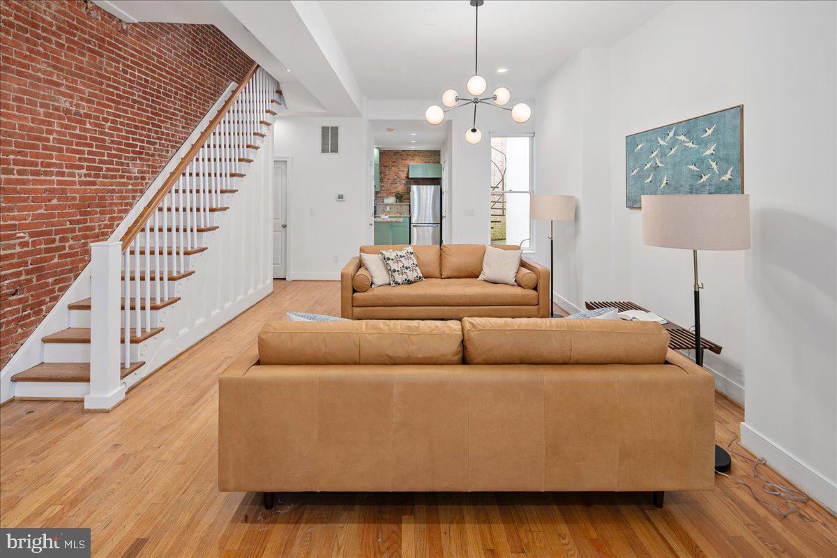 603 P Street Northwest Washington, DC 20001 - Photo 13 of 57 a living room with furniture and wooden floor