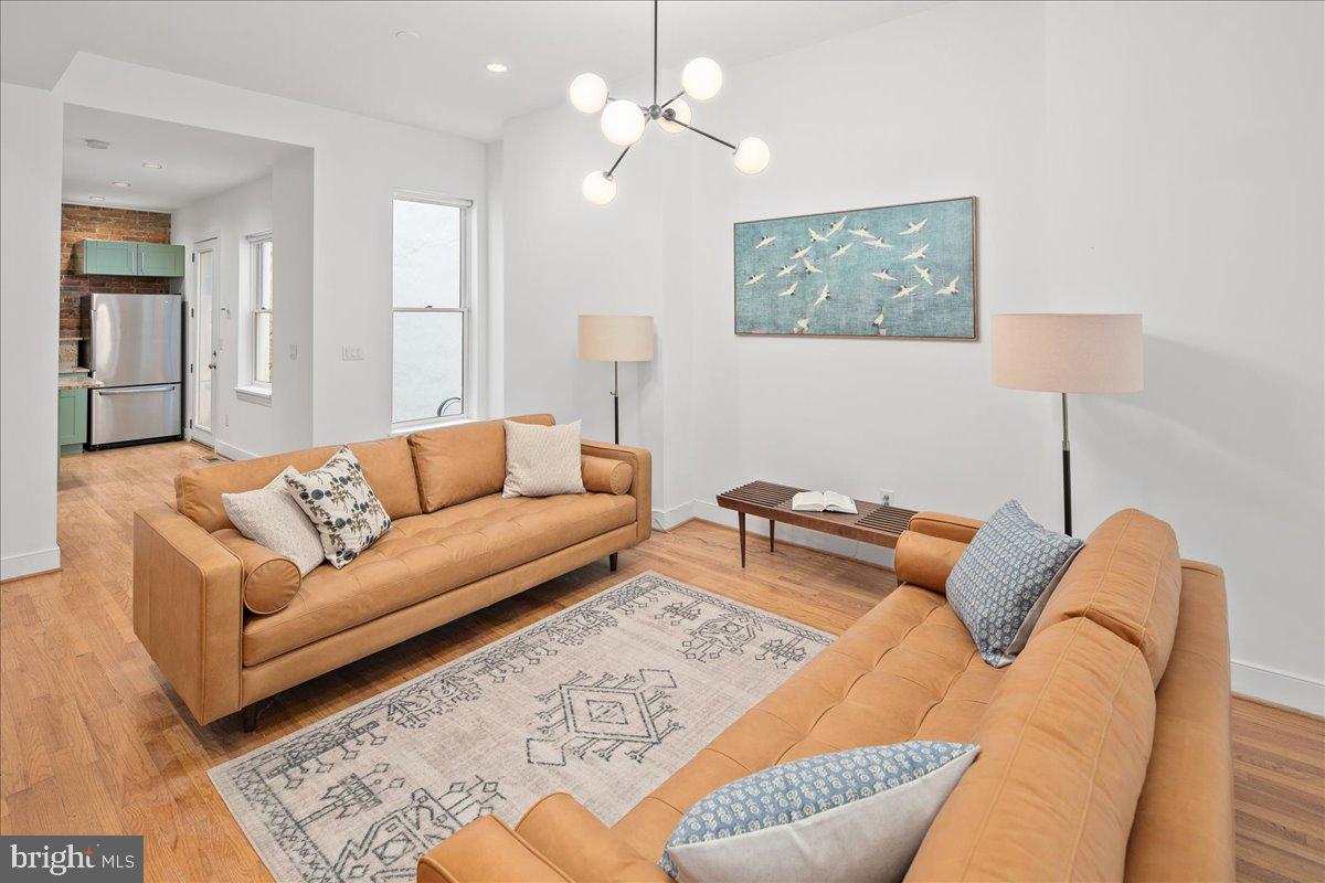 603 P Street Northwest Washington, DC 20001 - Photo 16 of 57 a living room with furniture and a lamp