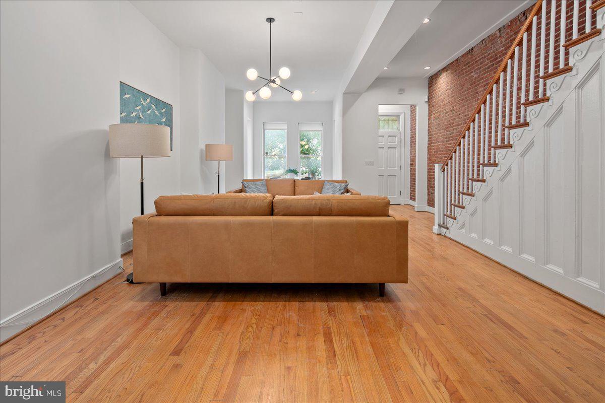 603 P Street Northwest Washington, DC 20001 - Photo 18 of 57 a living room with furniture and a wooden floor