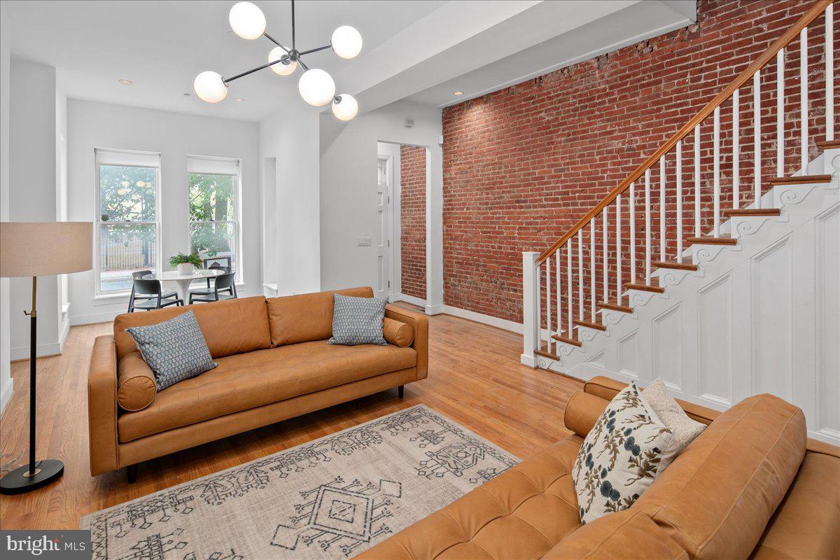 603 P Street Northwest Washington, DC 20001 - Photo 21 of 57 a living room with furniture and wooden floor