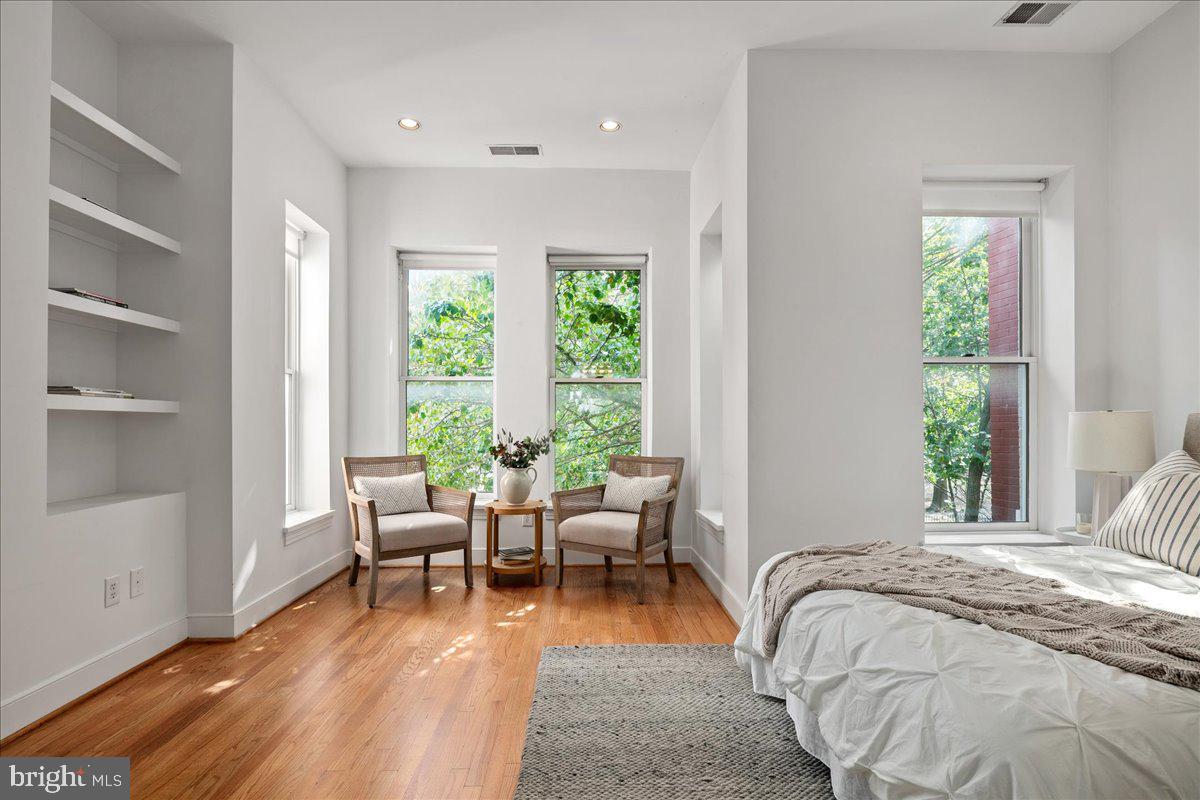 603 P Street Northwest Washington, DC 20001 - Photo 29 of 57 a bedroom with a bed and a large window