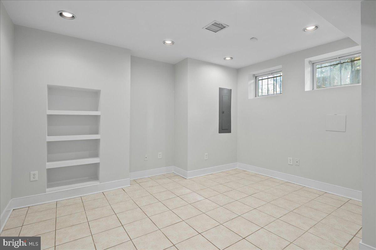 603 P Street Northwest Washington, DC 20001 - Photo 44 of 57 a view of an empty room with a window