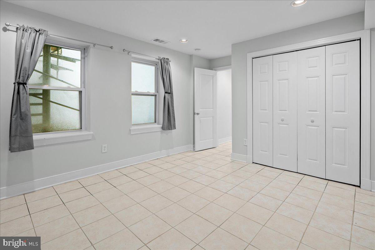 603 P Street Northwest Washington, DC 20001 - Photo 47 of 57 an empty room with windows