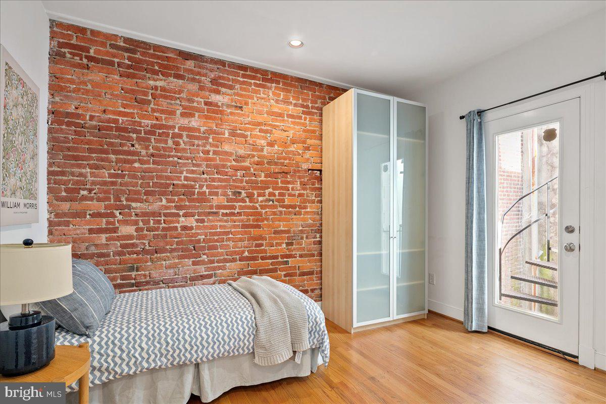 603 P Street Northwest Washington, DC 20001 - Photo 8 of 57 a bedroom with a bed and a window