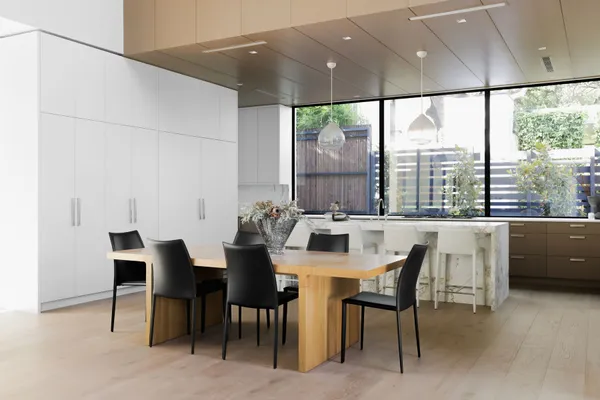 a view of a dining room with furniture window and outside view