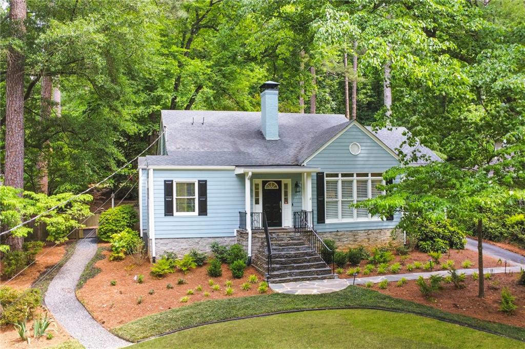 front view of a house with a yard