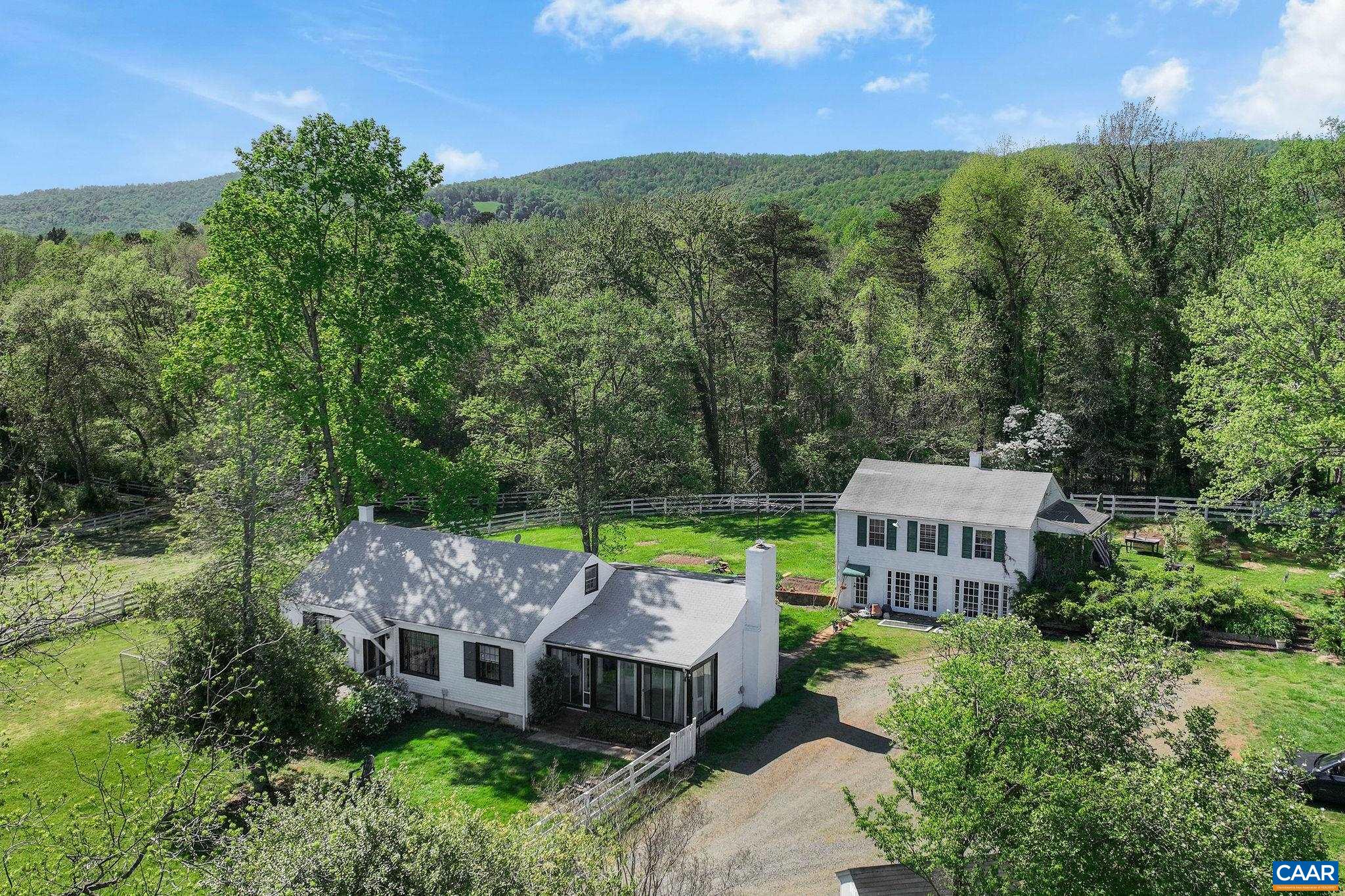 5374 Gordonsville Road Keswick, VA 22947 - Photo 1 of 35 an aerial view of a house with a garden