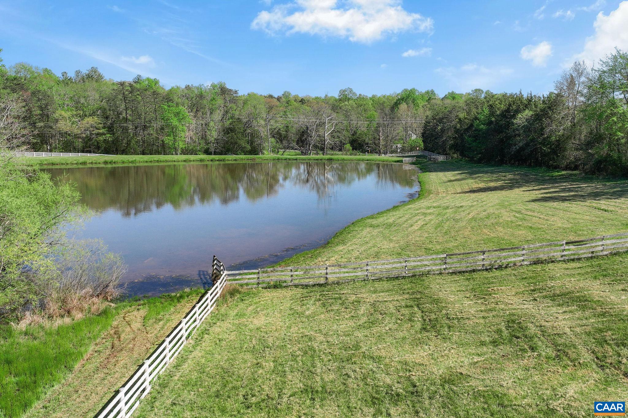 5374 Gordonsville Road Keswick, VA 22947 - Photo 29 of 35 a view of a lake from a yard