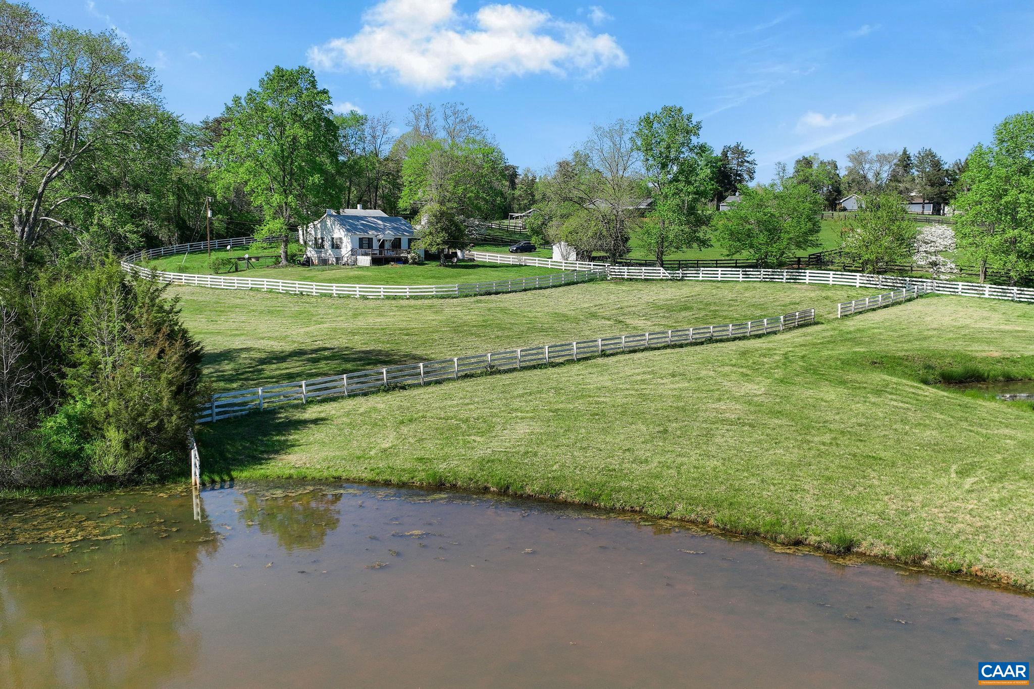 5374 Gordonsville Road Keswick, VA 22947 - Photo 30 of 35 a view of a golf course with lake view