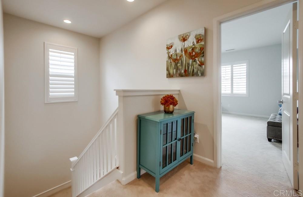 13413 Red Oak Way San Diego, CA 92130 - Photo 12 of 25 a view of hallway with window and a white table