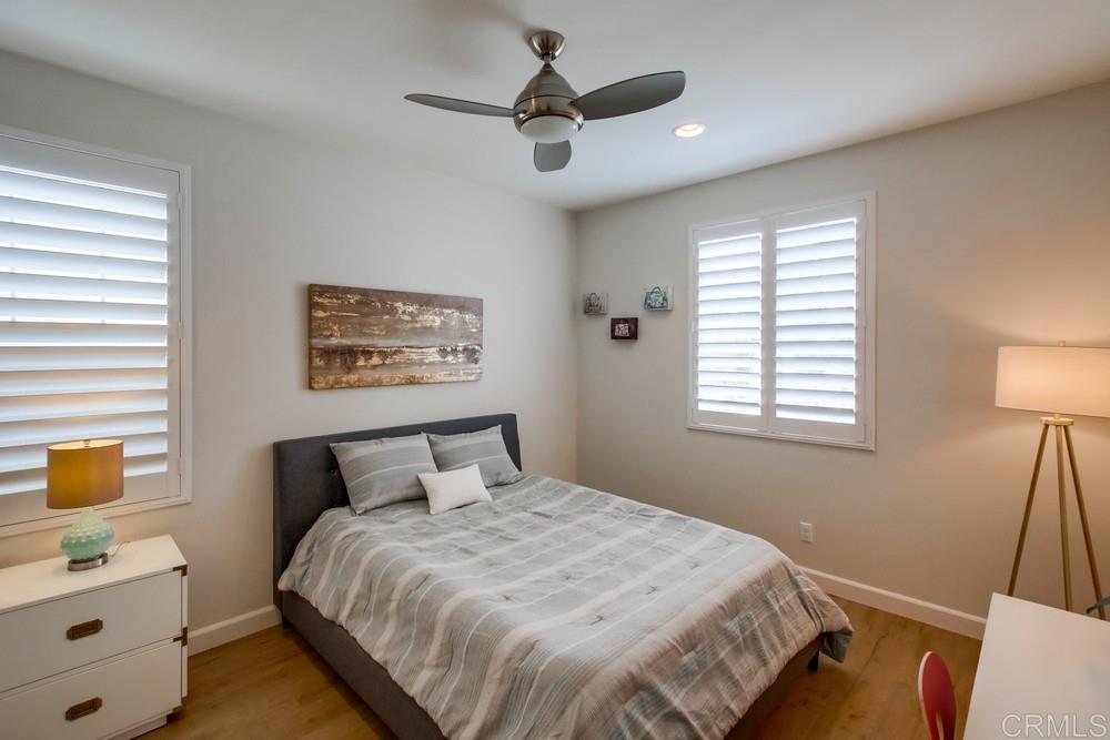 13413 Red Oak Way San Diego, CA 92130 - Photo 17 of 25 a bedroom with a bed and a window