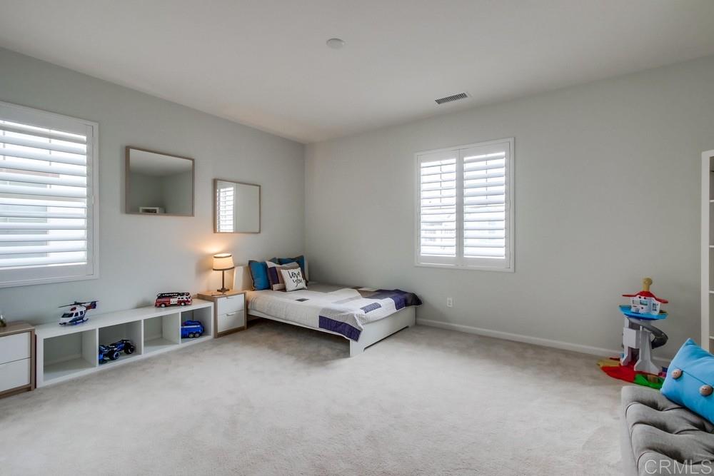 13413 Red Oak Way San Diego, CA 92130 - Photo 20 of 25 a living room with furniture and a window
