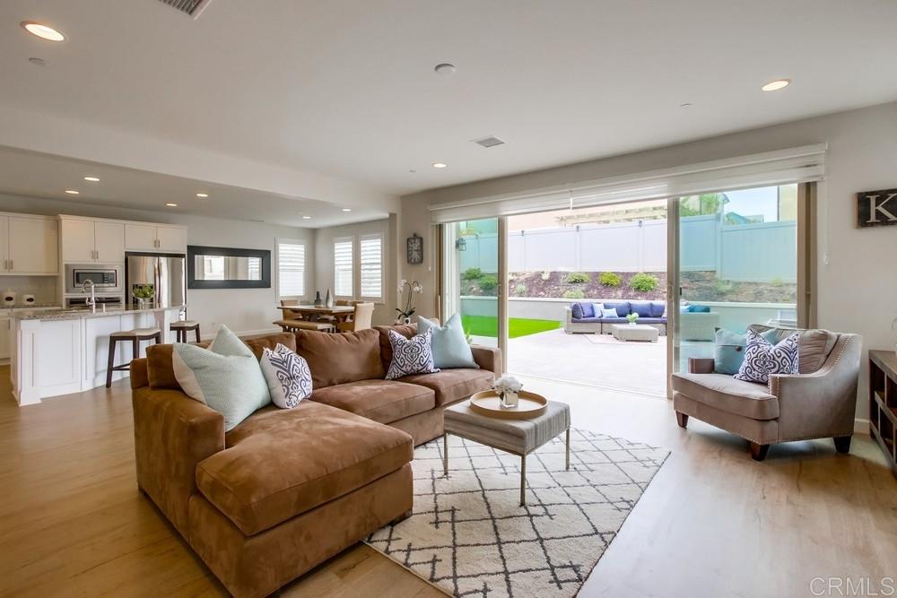 13413 Red Oak Way San Diego, CA 92130 - Photo 3 of 25 a living room with furniture and a large window
