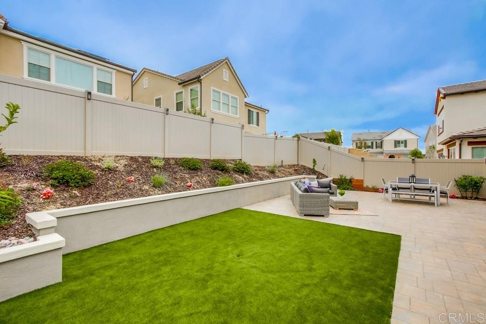 13413 Red Oak Way San Diego, CA 92130 - Photo 22 of 25 a view of a house with outdoor space and sitting area