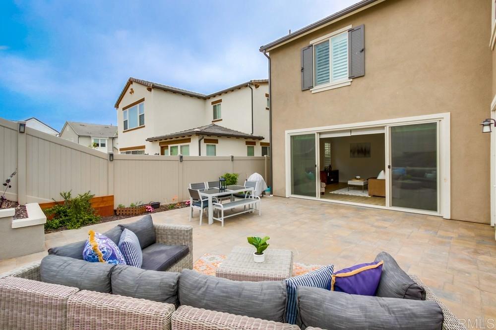 13413 Red Oak Way San Diego, CA 92130 - Photo 23 of 25 a living room with furniture and a potted plant