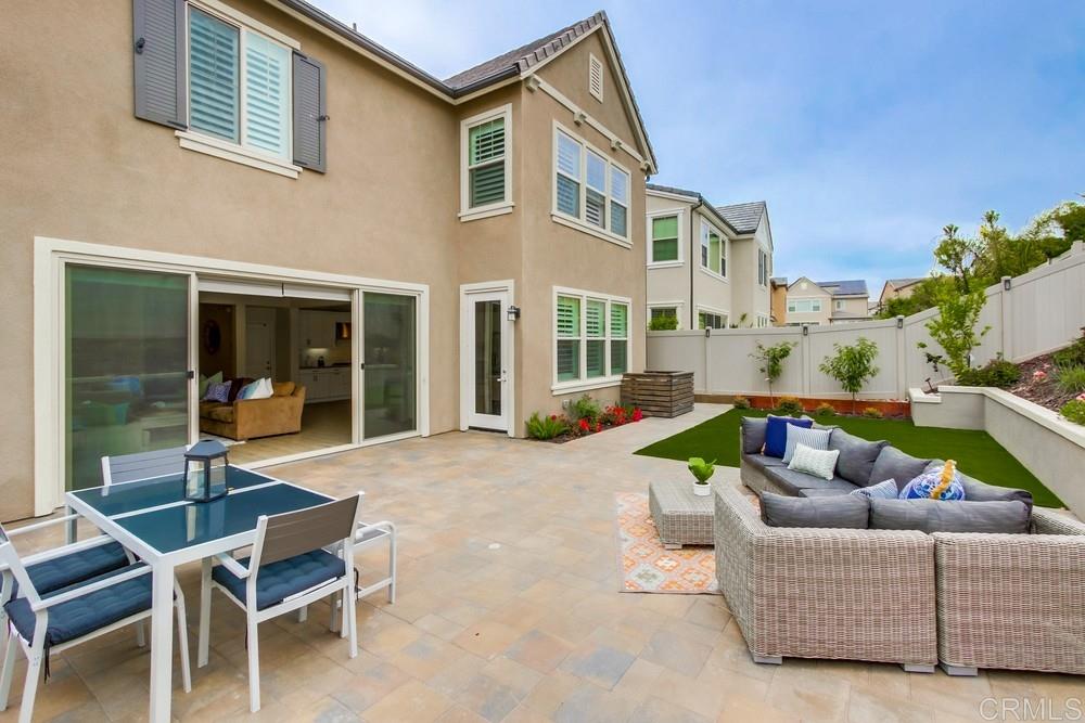 13413 Red Oak Way San Diego, CA 92130 - Photo 25 of 25 a view of a house with a couches and a patio