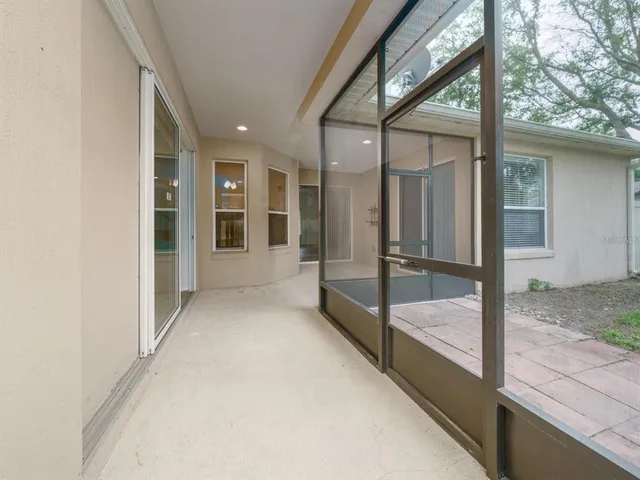 a view of a big room with a balcony and balcony