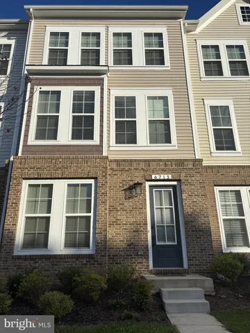 a front view of a multi story building