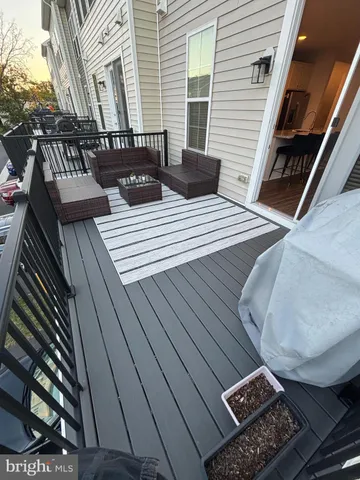 a view of balcony with wooden floor