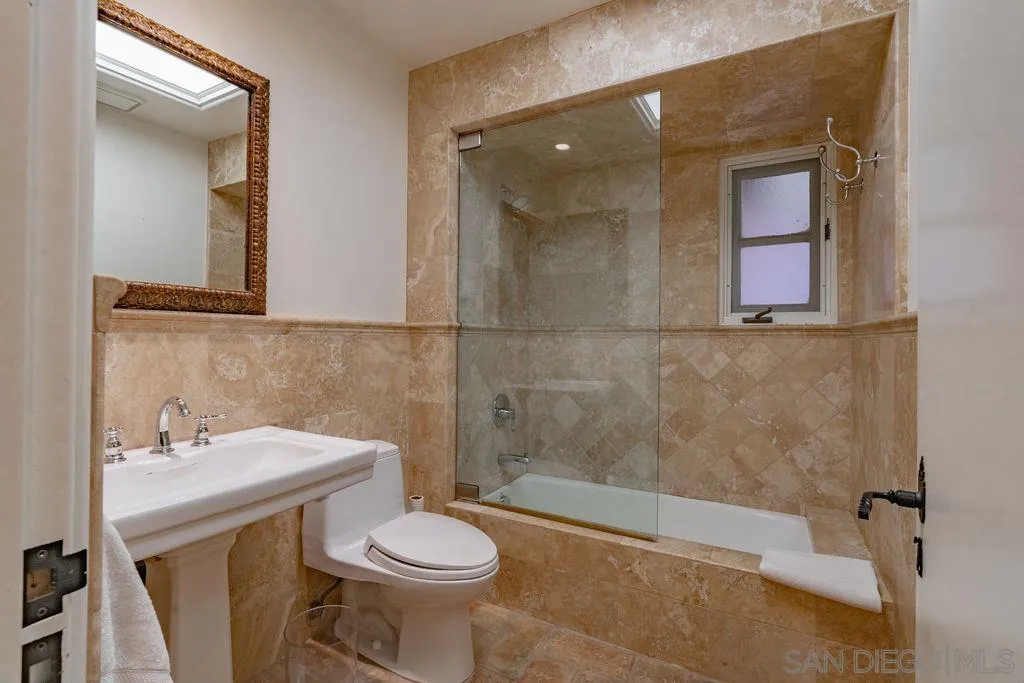 17116 Paseo Hermosa, Unit A Rancho Santa Fe, CA 92067 - Photo 19 of 47 a bathroom with a sink toilet and shower