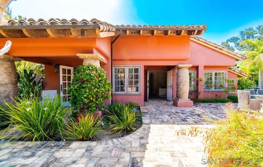 17116 Paseo Hermosa, Unit A Rancho Santa Fe, CA 92067 - Photo 29 of 47 a front view of a house with a porch