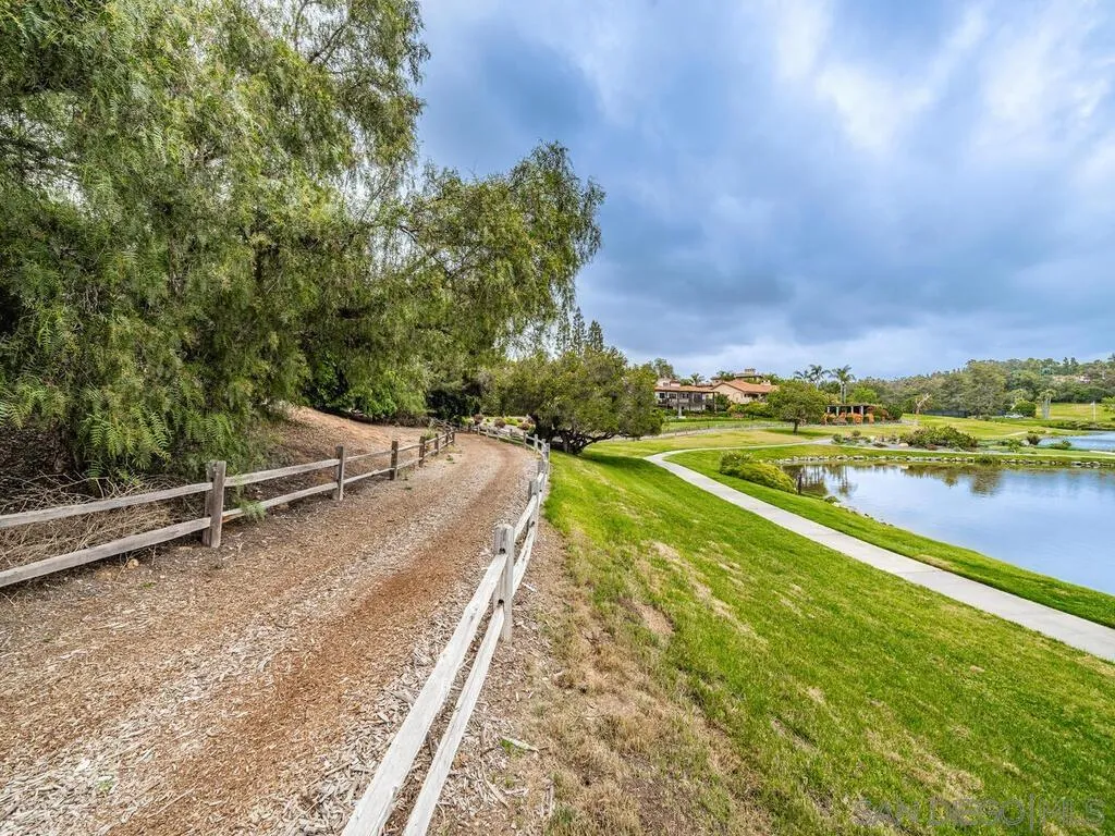 17116 Paseo Hermosa, Unit A Rancho Santa Fe, CA 92067 - Photo 46 of 47 a view of a swimming pool and an outdoor seating