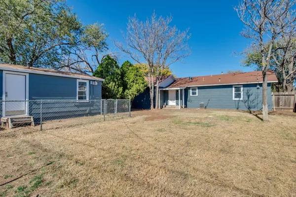 a house with trees in front of it