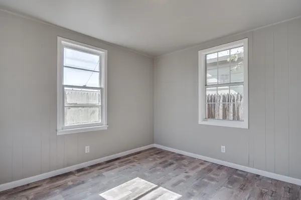 a view of an empty room and window