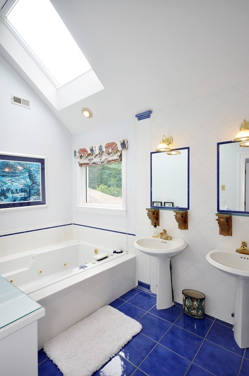 180 Pope Road Acton, MA 01720 - Photo 16 of 24 a bathroom with a sink a toilet and a bathtub