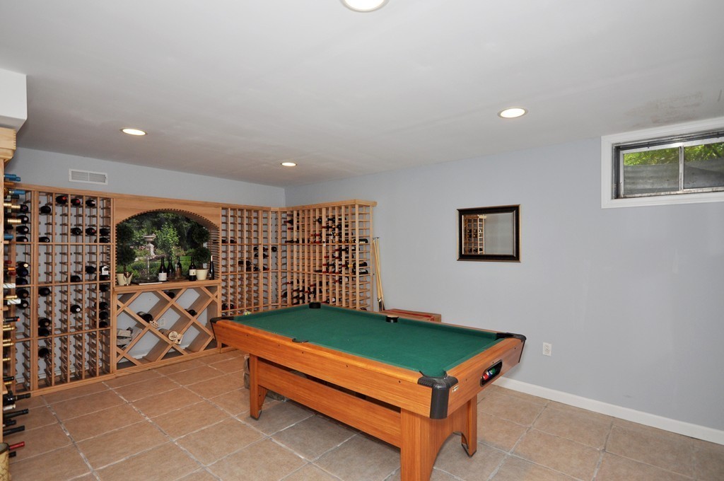 180 Pope Road Acton, MA 01720 - Photo 20 of 24 a room with gym equipment and a rug