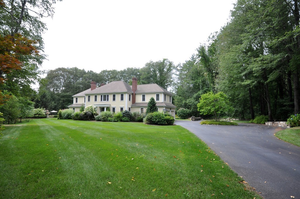 180 Pope Road Acton, MA 01720 - Photo 23 of 24 a view of a house with backyard and garden