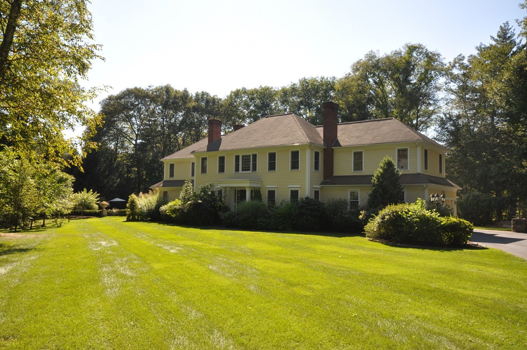 180 Pope Road Acton, MA 01720 - Photo 24 of 24 a front view of a house with a yard