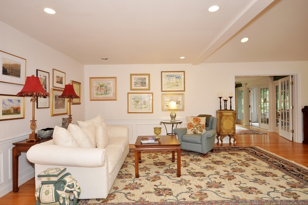 180 Pope Road Acton, MA 01720 - Photo 7 of 24 a living room with furniture and a rug