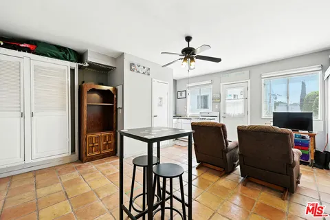 a kitchen with a stove and a sink