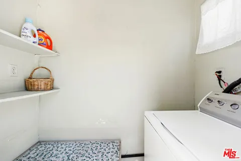 a picture of a wall with a white wall and a painting