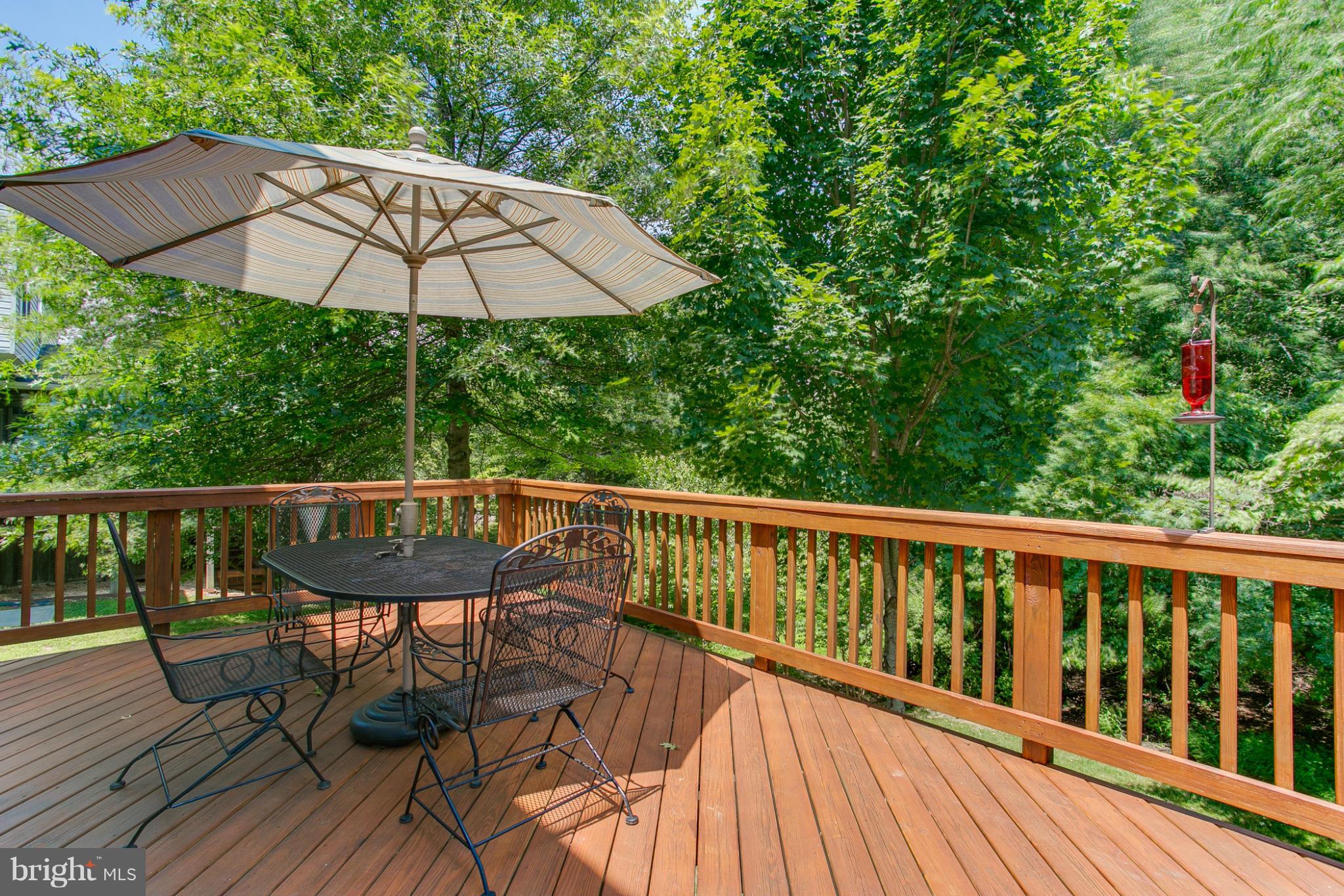 6409 Quiet Night Ride Columbia, MD 21044 - Photo 23 of 30 Deck off Kitchen with view of trees/open space