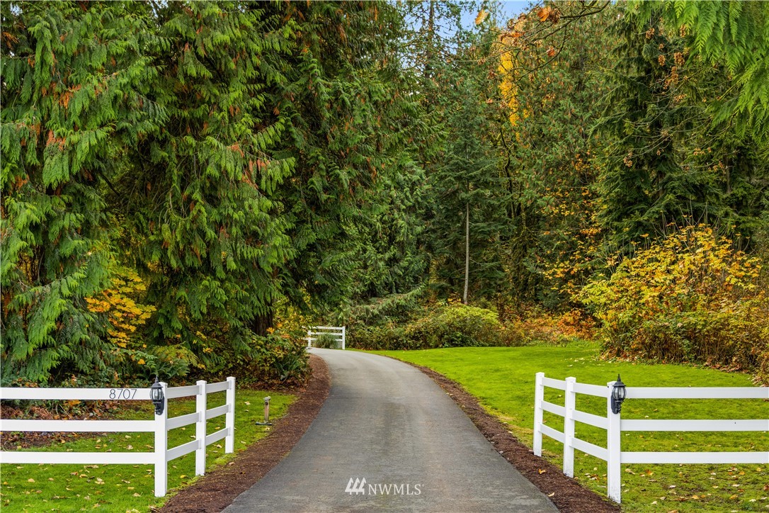 8707 West Snoqualmie Valley Road Northeast Carnation, WA 98014 - Photo 3 of 39 a view of a garden with an outdoor space